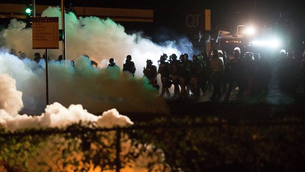 Ferguson MO Police clear streets in wake of protesting of Michael Brown murder
