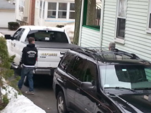 neuro car pulling into neighbor's driveway